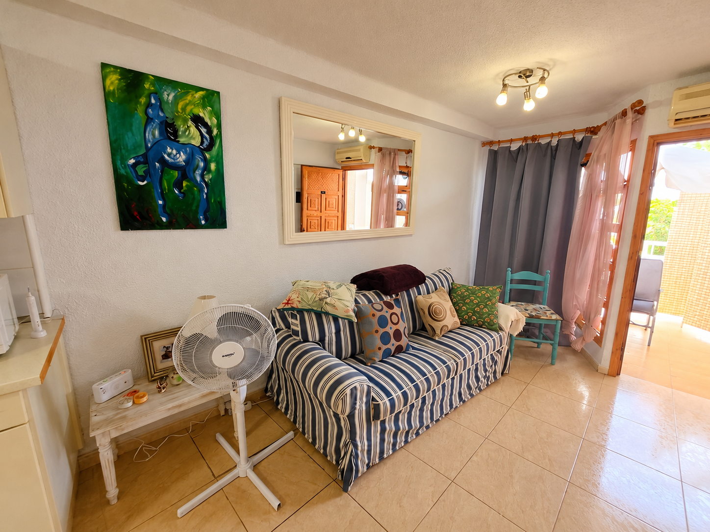 Cosy Empty Living Room with Balcony View