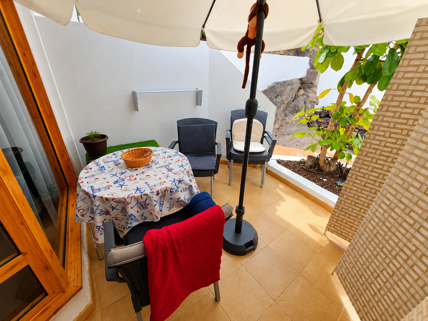 Mediterranean Terrace with Hanging Monkey